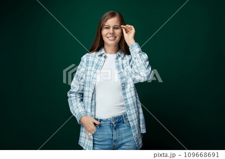 Young European woman with brown eyes dressed in casual comfortable clothes 109668691