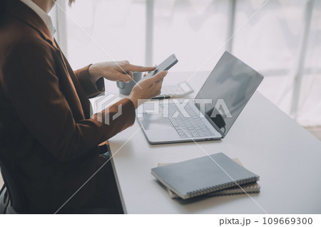 Audit concept,Administrator business man financial inspector and secretary making report calculating balance. Internal Revenue Service checking document. 109669300