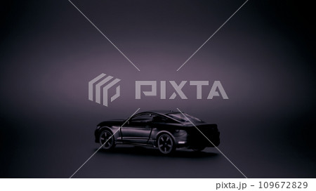 Silhouette of black sports car. Side view on a black background. Copy space. 109672829