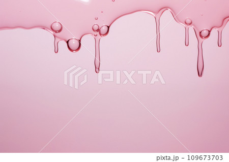 Transparent cosmetic liquid dripping from wall. Gel swatch texture on pink background. Hyaluronic smear pouring, lubricant oil with bubble, jelly lotion cosmetic product 109673703