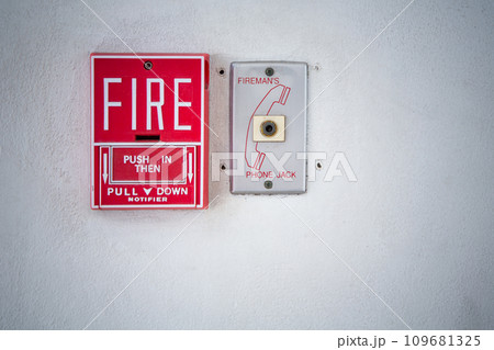 Red fire alarm switch Red fire alarm switch 109681325
