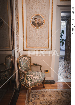 Experience the luxury and sophistication of a Venetian-style bedroom in this elegantly decorated space in Venice, Italy. Immerse yourself in the ambiance of high-quality furnishings 109683080