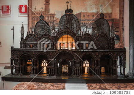 Highly detailed model of a church on display in a museum, showcasing intricate details of domes, spires, and architectural features. Part of a collection of shots of Venice, Italy. Highly detailed model of a church on display in a museum, showcasing intricate details of domes, spires, and architectural features. Part of a collection of shots of Venice, Italy. 109683782
