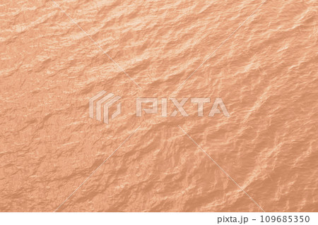 Peach Fuzz toned sea water texture. Pool water with sun reflections. Trendy colour 2024 year. 109685350