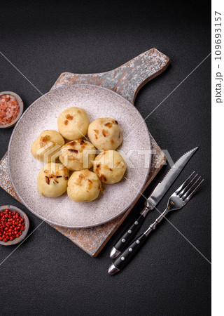 Delicious fresh cooked homemade dumplings with cheese, potatoes and salt Delicious fresh cooked homemade dumplings with cheese, potatoes and salt 109693157