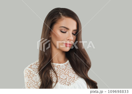 Perfect young female model woman with long healthy dark brown hair, shiny fresh skin. Perfect young female model woman with long healthy dark brown hair, shiny fresh skin. 109698833
