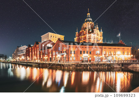 Helsinki, Finland. Bright Blue Starry Sky. View Of Kanavaranta Street With Uspenski Cathedral In Evening Night Illuminations. Dark Blue Dramatic Sky With Shining Stars. Azure Color Sky Helsinki, Finland. Bright Blue Starry Sky. View Of Kanavaranta Street With Uspenski Cathedral In Evening Night Illuminations. Dark Blue Dramatic Sky With Shining Stars. Azure Color Sky 109699323