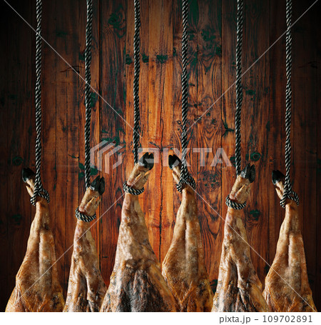 Dry Spanish ham, Jamon Serrano, Bellota, Italian Prosciutto Crudo or Parma ham. Dry Spanish ham, Jamon Serrano, Bellota, Italian Prosciutto Crudo or Parma ham. 109702891