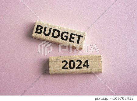 Budget 2024 symbol. Wooden blocks with words Budget 2024. Beautiful pink background. Business and Budget 2024 concept. Copy space. Budget 2024 symbol. Wooden blocks with words Budget 2024. Beautiful pink background. Business and Budget 2024 concept. Copy space. 109705415