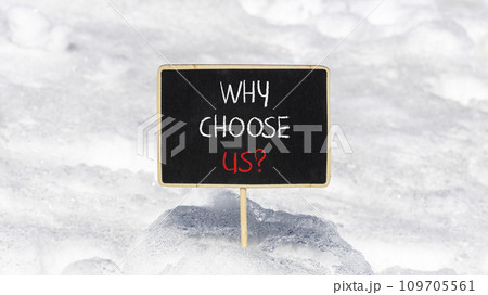 Why choose us symbol. Concept word Why choose us on beautiful wooden black chalk blackboard. White snow. Beautiful white snow background. Business motivational why choose us concept. Copy space. 109705561