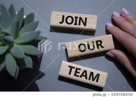 Join our team symbol. Wooden blocks with words Join our team. Beautiful grey background with succulent plant. Businessman hand. Business and Join our team concept. Copy space. Join our team symbol. Wooden blocks with words Join our team. Beautiful grey background with succulent plant. Businessman hand. Business and Join our team concept. Copy space. 109706050