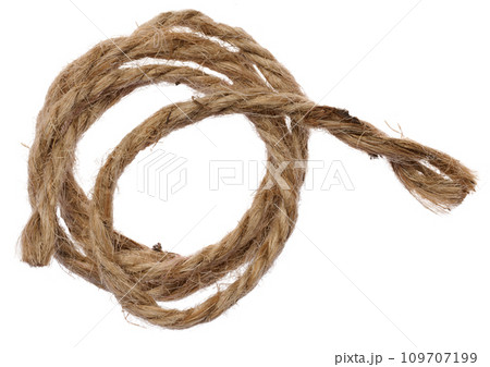 Brown twine rope on a white isolated background, top view. 109707199