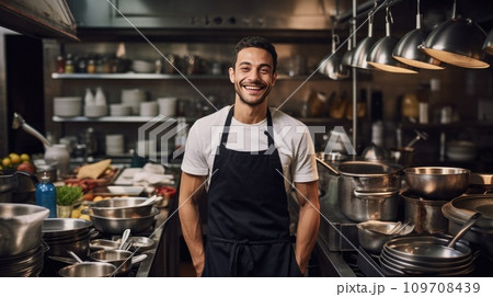 a chef in a bustling kitchen, surrounded by pots and pans, with a confident grin on his face 109708439