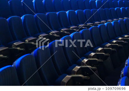 Full frame of folded bleachers in empty auditorium at conference hall 109709696