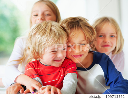 Family, brothers or sisters for hug together for love, relax wellness and happiness with sibling support in home. Boys, girl and smile face for fun games in happy, bonding or care in morning in house 109713562