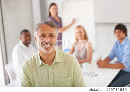 Presentation meeting, business portrait and mature man smile for sales mentoring, workshop training or project management. Teamwork mentor, happiness and boss happy for employees brainstorming plan 109713650