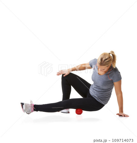 Massage ball, woman and leg health for fitness, workout and sport training injury in studio. Physio, stretching and exercise equipment with female person bruise and wellness with white background 109714073