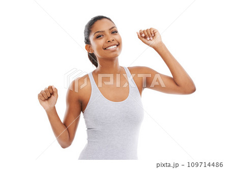 Woman, portrait and fitness dance with a smile and confidence in a studio for exercise and training. Wellness, happy and female person with workout and music with white background and athlete 109714486