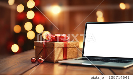 Delivered parcel box on table with laptop blurred home background. Christmas Online shopping. Black Friday sale. 109714641