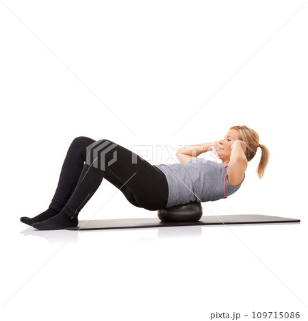 Pilates, sit up and woman exercise on ball, workout or training healthy body isolated on a white studio background mockup space. Core muscle, mat and person on equipment for fitness or strong abdomen 109715086