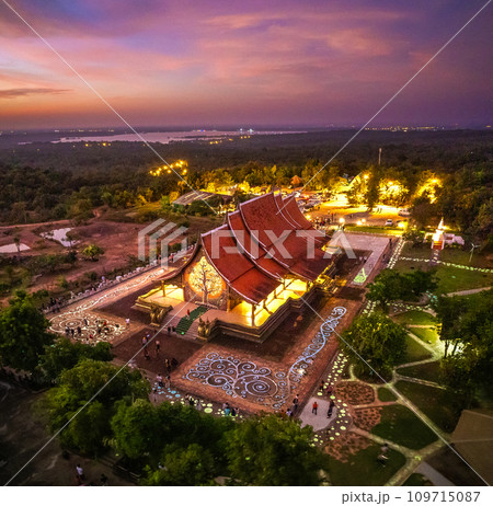 Aerial view of Wat Sirindhorn Wararam glowing temple in Ubon, Thailand 109715087