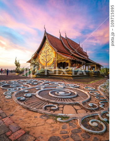 Wat Sirindhorn Wararam glowing temple in Ubon, Thailand 109715095