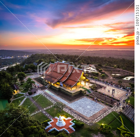 Aerial view of Wat Sirindhorn Wararam glowing temple in Ubon, Thailand Aerial view of Wat Sirindhorn Wararam glowing temple in Ubon, Thailand 109715101