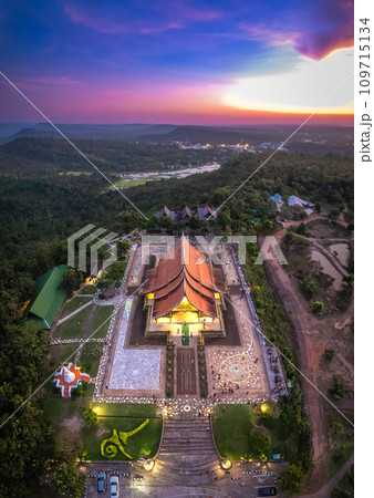 Aerial view of Wat Sirindhorn Wararam glowing temple in Ubon, Thailand 109715134