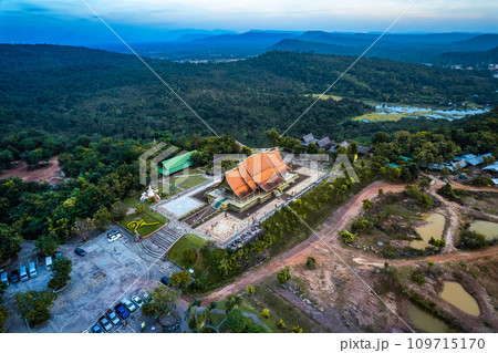 Aerial view of Wat Sirindhorn Wararam glowing temple in Ubon, Thailand 109715170