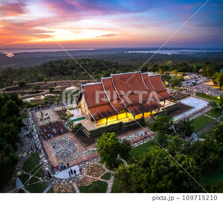 Aerial view of Wat Sirindhorn Wararam glowing temple in Ubon, Thailand 109715210