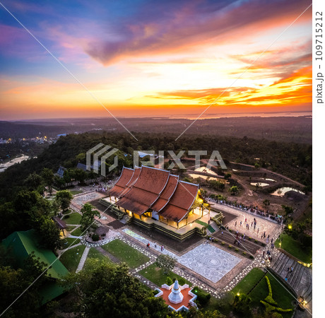 Aerial view of Wat Sirindhorn Wararam glowing temple in Ubon, Thailand 109715212