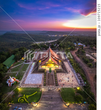 Aerial view of Wat Sirindhorn Wararam glowing temple in Ubon, Thailand 109715215