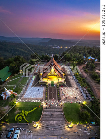 Aerial view of Wat Sirindhorn Wararam glowing temple in Ubon, Thailand 109715221