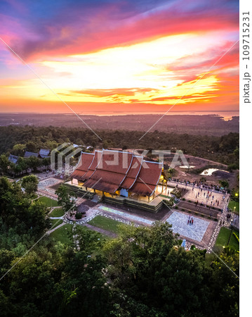 Aerial view of Wat Sirindhorn Wararam glowing temple in Ubon, Thailand 109715231