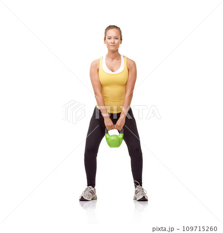 Training, portrait and studio woman with kettlebell for muscle growth, strength development or weightlifting performance. Gym equipment, bodybuilding routine and athlete isolated on white background 109715260