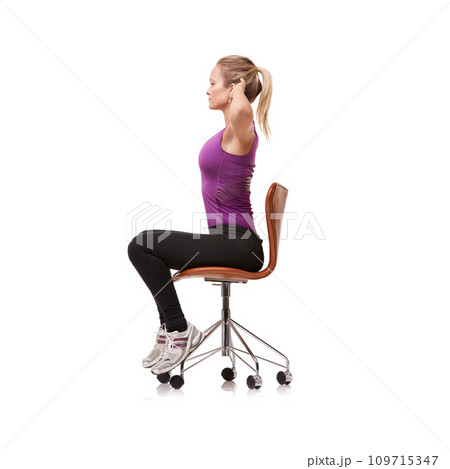 Office, chair and woman stretching for posture, health and fitness in white background or studio. Sitting, exercise and person training arms with seated core stretches or practice for wellness 109715347