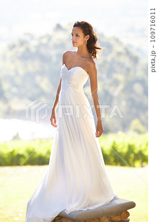 Woman, wedding dress and marriage in garden celebration or commitment, love or partnership promise. Female person, bride and elegant gown or summer park ceremony for happy, romance or nature party Woman, wedding dress and marriage in garden celebration or commitment, love or partnership promise. Female person, bride and elegant gown or summer park ceremony for happy, romance or nature party 109716011