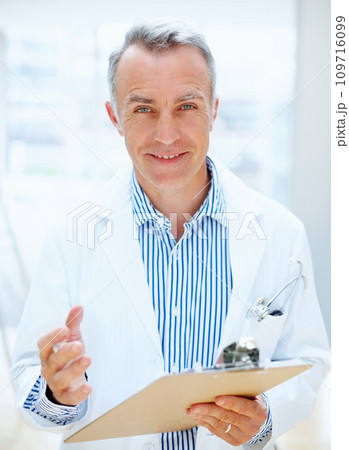 Question, health and portrait of doctor with clipboard, chart or survey for insurance and medical information. Surgeon, man and talking with paperwork, report or checklist at clinic or hospital Question, health and portrait of doctor with clipboard, chart or survey for insurance and medical information. Surgeon, man and talking with paperwork, report or checklist at clinic or hospital 109716099