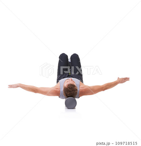 Balance, foam roller and person in pilates training, floor stability or muscle endurance activity for spine rehabilitation. Studio, mockup space and athlete core strength exercise on white background 109718515