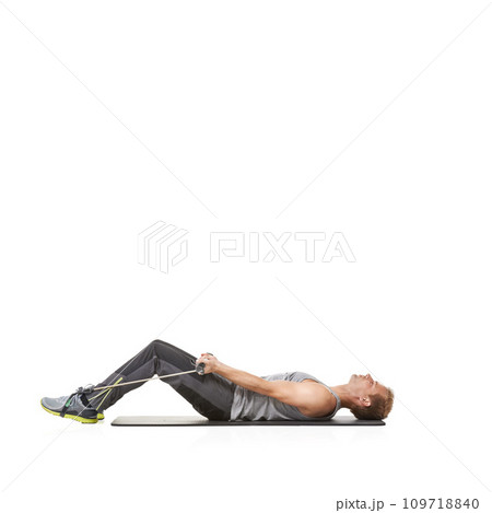 Exercise, man and resistance band with training, stretching and healthy isolated on white studio background. Mockup space, person and model with workout, wellness or progress with energy or endurance Exercise, man and resistance band with training, stretching and healthy isolated on white studio background. Mockup space, person and model with workout, wellness or progress with energy or endurance 109718840