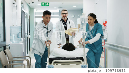 Doctors, people talking and push patient hospital bed, consulting and feedback on medicine treatment, support or ICU surgery. Teamwork, conversation and walking team, nurses or surgeon helping client Doctors, people talking and push patient hospital bed, consulting and feedback on medicine treatment, support or ICU surgery. Teamwork, conversation and walking team, nurses or surgeon helping client 109718951