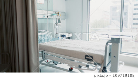 Hospital, healthcare or interior of bedroom or empty room for wellness, consulting or healing. Background, medical or clinic space for emergency, rehabilitation or recovery with furniture or light 109719188