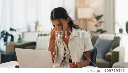Woman, headache and work from home stress on laptop for marketing mistake, copywriting fail or online report. Young freelancer with pain, fatigue or health risk for social media deadline on computer 109719546