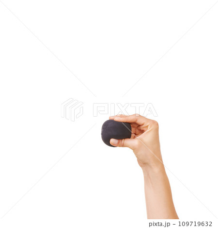 Person, hand and stress ball for anxiety, exercise or squeeze against a white studio background. Closeup of human palm with round object in anger management, relief or tension on mockup space Person, hand and stress ball for anxiety, exercise or squeeze against a white studio background. Closeup of human palm with round object in anger management, relief or tension on mockup space 109719632
