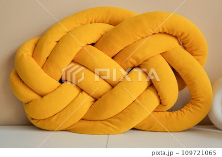 orange color sofa pillow on table orange color sofa pillow on table 109721065