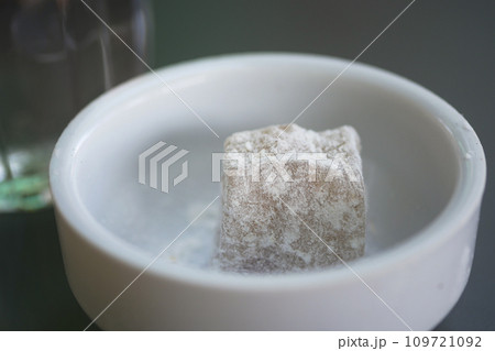 turkish delight or lokum of white in a small container  turkish delight or lokum of white in a small container  109721092