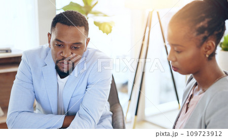 Business people, brainstorming and man with black woman, meeting and cooperation in a workplace. Teamwork, employee and manager with paperwork, planning and collaboration with partnership and ideas 109723912