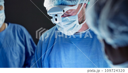 Surgeon, team of doctors and tools in operation theater, hospital or clinic. Group, medical nurse and surgery equipment in emergency room for healthcare, treatment and people working to help in ICU 109724320