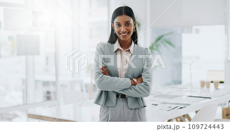 Business woman, portrait and smile with arms crossed in an office for confidence and career pride. Professional entrepreneur person from India at corporate company with positive attitude or happiness 109724443