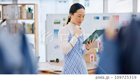 Tablet, startup and young woman with business checking company website online on internet. Digital technology, retail and Asian female owner scroll for delivery information in store, shop or boutique 109725319